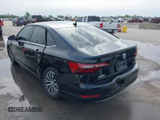 2021 Volkswagen Jetta S with VIN 3VWC57BU1MM006316, listed as a IAAI auction lot 42139509 with 97,192 mi miles and . Bid and sale history available at DreamBid. Image 3.