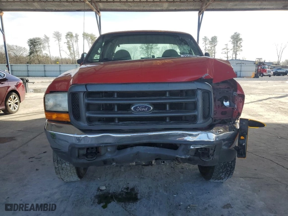 2000 Ford Super Duty F-250 XL with VIN 1FTNX21F2YED52849, listed as a Copart auction lot 43945245 with 291,719 mi miles and Salvage Title. Bid and sale history available at carsss.com. Image 5.