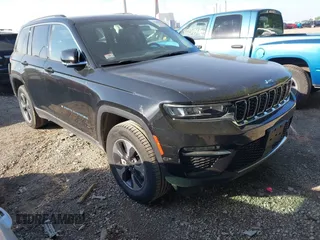 2023 Jeep Grand Cherokee with VIN 1C4RJYB68PC648859, listed as a IAAI auction lot 42267180 with 29,809 mi miles and . Bid and sale history available at DreamBid. Image 1.