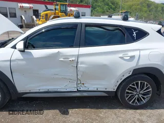 2020 Hyundai Tucson SEL z VIN KM8J3CAL4LU203021, wystawiony jako IAAI lot #42167082 z przebiegiem 49 826 mil mil oraz . Historia ofert i sprzedaży dostępna na DreamBid. Obrazek 6.