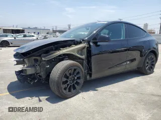2024 Tesla Model Y Long Range z VIN 7SAYGDEEXRA253111, wystawiony jako Copart lot #60929295 z przebiegiem 16 423 mil mil oraz Szkoda całkowita • Salvage title. Historia ofert i sprzedaży dostępna na DreamBid. Obrazek 1.