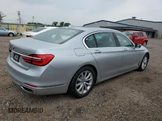 2018 BMW 7 Series 740i xDrive with VIN WBA7E4C56JGV23835, listed as a Copart auction lot 55254573 with 103,713 mi miles. Bid and sale history available at carsss.com. Image 3.
