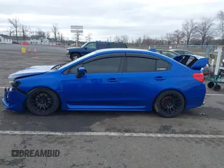 2016 Subaru WRX with VIN JF1VA1B64G9829384, listed as a IAAI auction lot 41811036 with 108,450 mi miles. Bid and sale history available at carsss.com. Image 14.