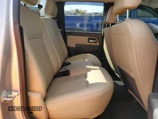 2010 GMC Canyon z VIN 1GTJTFDP2A8135909, wystawiony jako Copart lot #48905005 z przebiegiem Nie podano mil oraz Szkoda całkowita • Salvage title. Historia ofert i sprzedaży dostępna na DreamBid. Obrazek 10.