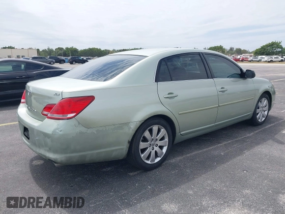 2007 Toyota Avalon XL with VIN 4T1BK36B27U219456, listed as a IAAI auction lot 41747807 with 169,599 mi miles. Bid and sale history available at carsss.com. Image 4.