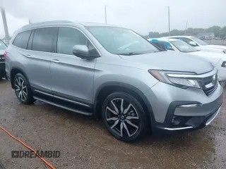 2019 Honda Pilot Touring 8-Passenger with VIN 5FNYF6H98KB097105, listed as a IAAI auction lot 42353009 with 133,212 mi miles and . Bid and sale history available at DreamBid. Image 1.