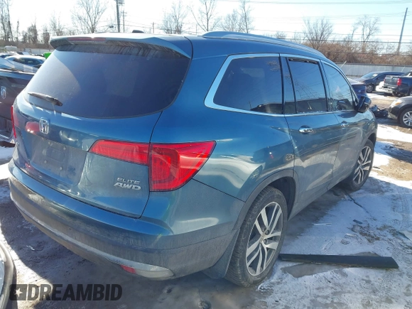 2016 Honda Pilot Elite with VIN 5FNYF6H04GB060786, listed as a IAAI auction lot 41335550 with 152,863 mi miles. Bid and sale history available at carsss.com. Image 4.