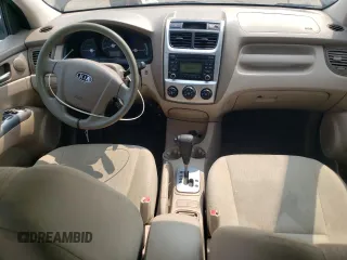 2009 Kia Sportage LX z VIN KNDJE723897637079, wystawiony jako Copart lot #59531885 z przebiegiem 176 267 mil mil oraz Czysty tytuł • Clean title. Historia ofert i sprzedaży dostępna na DreamBid. Obrazek 8.
