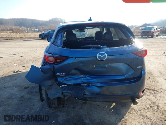 2018 Mazda CX-5 Touring z VIN JM3KFBCM2J0461954, wystawiony jako IAAI lot #41655865 z przebiegiem 129 333 mil mil oraz . Historia ofert i sprzedaży dostępna na DreamBid. Obrazek 15.