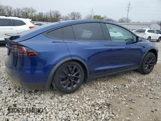 2023 Tesla Model X with VIN 7SAXCDE51PF415778, listed as a Copart auction lot 51792205 with Not Provided miles and Salvage Title. Bid and sale history available at DreamBid. Image 3.