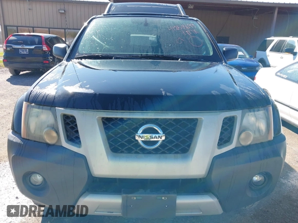 2012 Nissan Xterra S with VIN 5N1AN0NW2CC521142, listed as a IAAI auction lot 41858699 with 214,789 mi miles and . Bid and sale history available at DreamBid. Image 6.