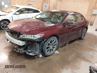 2015 Acura TLX Advance z VIN 19UUB3F70FA010680, wystawiony jako IAAI lot #41609571 z przebiegiem 123 004 mil mil oraz . Historia ofert i sprzedaży dostępna na DreamBid. Obrazek 17.