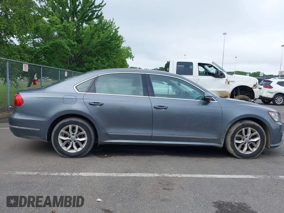 2016 Volkswagen Passat S with VIN 1VWAT7A30GC054210, listed as a IAAI auction lot 42452304 with 119,842 mi miles and . Bid and sale history available at DreamBid. Image 13.