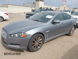 2015 Jaguar XF T Premium with VIN SAJWA0FS1FPU58051, listed as a IAAI auction lot 41690461 with 128,900 mi miles and . Bid and sale history available at DreamBid. Image 2.