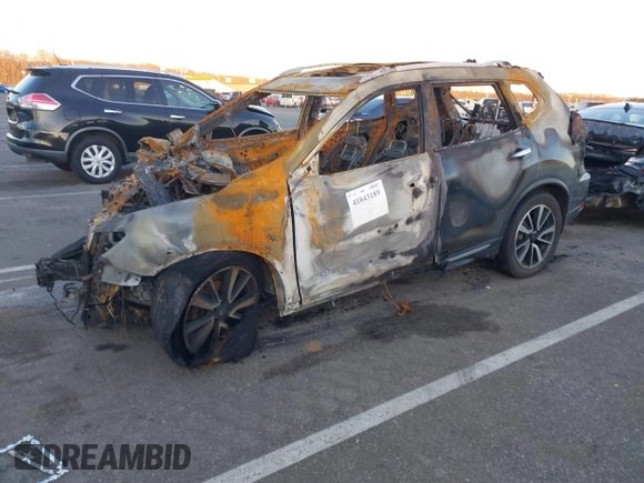 2017 Nissan Rogue S with VIN JN8AT2MV4HW016471, listed as a IAAI auction lot 41043189 with Not Provided miles and . Bid and sale history available at DreamBid. Image 2.