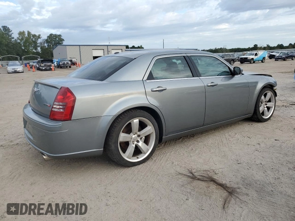 2006 Chrysler 300 C SRT8 with VIN 2C3KA73W06H372249, listed as a Copart auction lot 69399774 with 112,872 mi miles and Salvage Title. Bid and sale history available at carsss.com. Image 3.