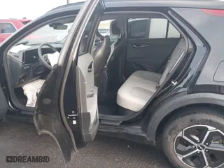 2023 Kia Niro EX with VIN KNDCR3LE6P5081594, listed as a IAAI auction lot 41772925 with 24,693 mi miles. Bid and sale history available at carsss.com. Image 8.