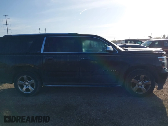 2016 Chevrolet Suburban LTZ with VIN 1GNSCJKC9GR212874, listed as a IAAI auction lot 41125926 with 82,714 mi miles and . Bid and sale history available at DreamBid. Image 13.