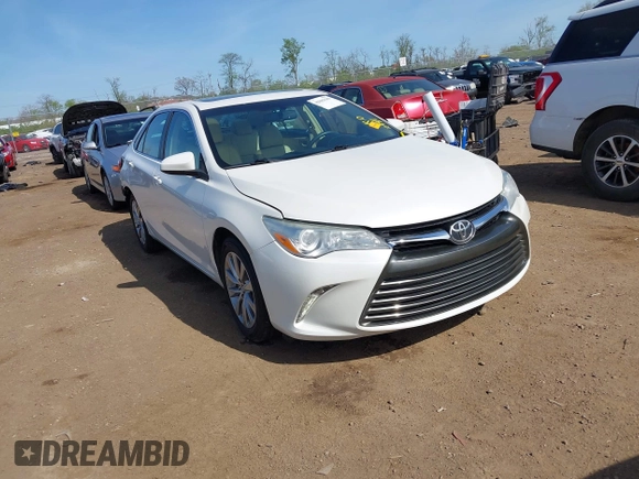 2015 Toyota Camry XLE with VIN 4T1BF1FK1FU977554, listed as a IAAI auction lot 42083589 with 104,811 mi miles and . Bid and sale history available at DreamBid. Image 1.