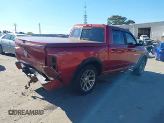 2011 Ram 1500 Big Horn with VIN 1D7RV1CT0BS623605, listed as a IAAI auction lot 41278351 with 198,313 mi miles and . Bid and sale history available at DreamBid. Image 4.