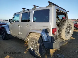 2013 Jeep Wrangler Unlimited Rubicon with VIN 1C4BJWFGXDL556365, listed as a Copart auction lot 88906315 with 113,880 mi miles and Salvage Title. Bid and sale history available at carsss.com. Image 2.