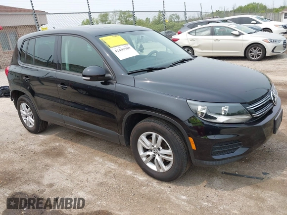 2013 Volkswagen Tiguan S with VIN WVGAV3AX2DW594334, listed as a IAAI auction lot 42405989 with 96,559 mi miles and . Bid and sale history available at DreamBid. Image 1.