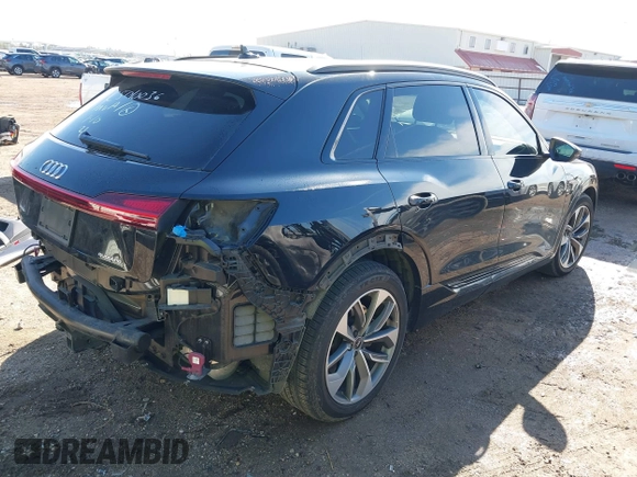 2021 Audi e-tron Premium Plus with VIN WA1LAAGE4MB010570, listed as a IAAI auction lot 41398464 with 67,721 mi miles. Bid and sale history available at carsss.com. Image 4.
