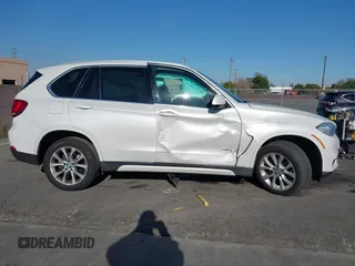 2014 BMW X5 sDrive35i with VIN 5UXKR2C54E0C01376, listed as a IAAI auction lot 41647680 with 50,941 mi miles. Bid and sale history available at carsss.com. Image 13.