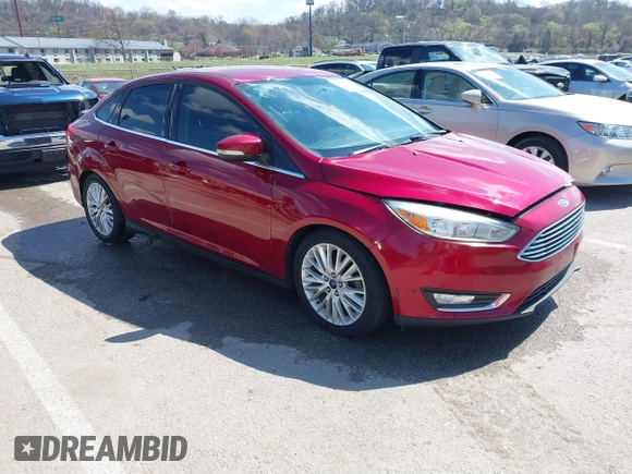 2015 Ford Focus Titanium with VIN 1FADP3J29FL230664, listed as a IAAI auction lot 41870083 with 125,578 mi miles and . Bid and sale history available at DreamBid. Image 1.