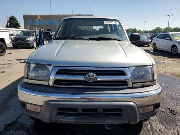 1999 Toyota 4Runner z VIN JT3HM84R7X0035003, wystawiony jako Copart lot #60071745 z przebiegiem 266 385 mil mil oraz Szkoda całkowita • Salvage title. Historia ofert i sprzedaży dostępna na DreamBid. Obrazek 5.