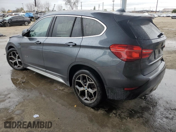 2016 BMW X1 xDrive28i with VIN WBXHT3C31G5E55041, listed as a Copart auction lot 48928705 with 104,799 mi miles and Salvage Title. Bid and sale history available at carsss.com. Image 2.