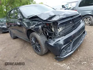 2016 Dodge Durango R/T with VIN 1C4SDJCT8GC353989, listed as a IAAI auction lot 42367058 with 222,374 mi miles and . Bid and sale history available at DreamBid. Image 1.