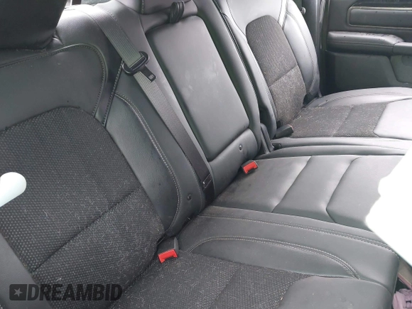 2021 Ram 1500 Rebel with VIN 1C6SRFLT0MN734774, listed as a IAAI auction lot 41075676 with 95,808 mi miles and . Bid and sale history available at DreamBid. Image 8.