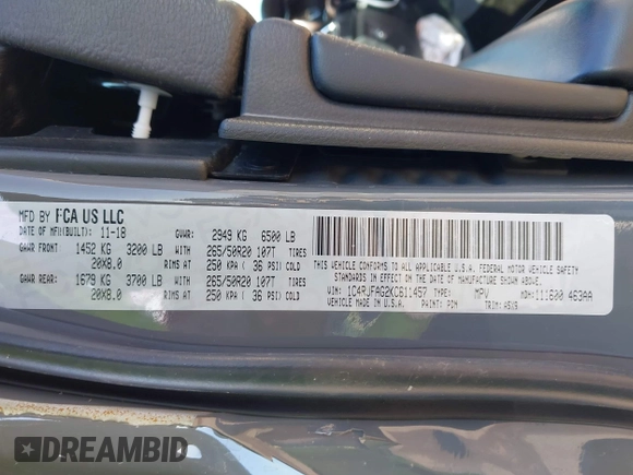 2019 Jeep Grand Cherokee Laredo E with VIN 1C4RJFAG2KC611457, listed as a IAAI auction lot 42212982 with 97,603 mi miles and . Bid and sale history available at DreamBid. Image 9.