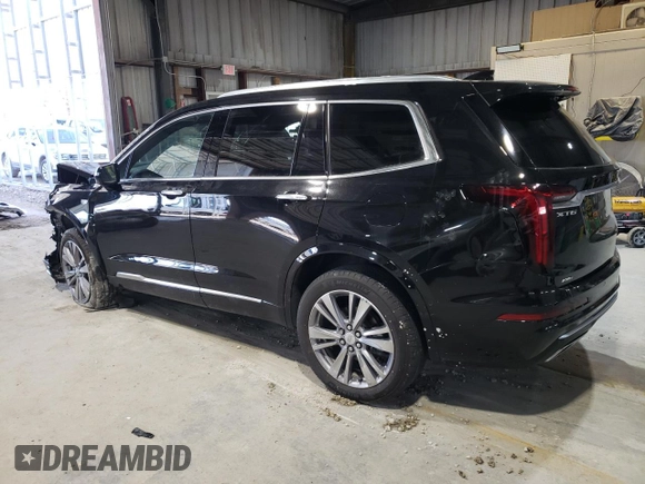 2023 Cadillac XT6 AWD Premium Luxury with VIN 1GYKPFRS3PZ121942, listed as a Copart auction lot 46489545 with 35,453 mi miles and Salvage Title. Bid and sale history available at DreamBid. Image 2.