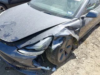 2023 Tesla Model 3 z VIN 5YJ3E1EA2PF569644, wystawiony jako IAAI lot #41831560 z przebiegiem 30 903 mil mil oraz . Historia ofert i sprzedaży dostępna na DreamBid. Obrazek 6.