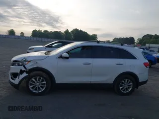 2017 Kia Sorento LX with VIN 5XYPG4A35HG205801, listed as a IAAI auction lot 42143064 with 129,647 mi miles. Bid and sale history available at carsss.com. Image 14.