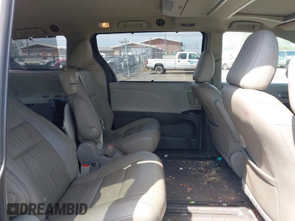 2015 Toyota Sienna XLE with VIN 5TDYK3DC8FS654902, listed as a IAAI auction lot 41953705 with 169,036 mi miles. Bid and sale history available at carsss.com. Image 8.