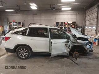 2019 Honda Pilot EX-L with VIN 5FNYF6H57KB050130, listed as a IAAI auction lot 42052495 with Not Provided miles and . Bid and sale history available at carsss.com. Image 13.