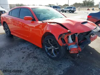 2018 Dodge Charger SXT Plus with VIN 2C3CDXHG7JH220880, listed as a IAAI auction lot 41708976 with 90,804 mi miles. Bid and sale history available at carsss.com. Image 1.