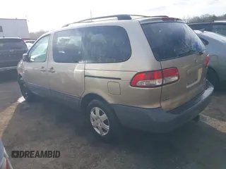 2001 Toyota Sienna CE with VIN 4T3ZF19C91U351141, listed as a IAAI auction lot 41608484 with 325,657 mi miles. Bid and sale history available at carsss.com. Image 3.