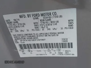 2014 Ford F-150 XL with VIN 1FTFX1EF2EFC81067, listed as a IAAI auction lot 41697190 with 105,584 mi miles. Bid and sale history available at carsss.com. Image 9.