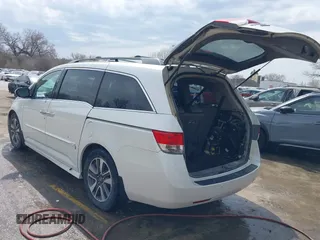 2014 Honda Odyssey Touring с VIN 5FNRL5H94EB057681, выставлен на аукционе IAAI как лот 41828000 с пробегом 249 350 миль миль и . История ставок и продаж доступна на DreamBid. Изображение 3.