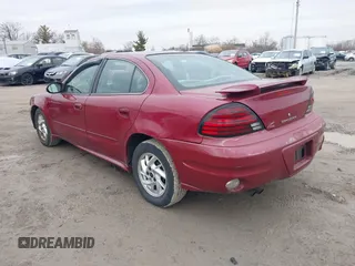 2004 Pontiac Grand Am SE with VIN 1G2NE52F14M652117, listed as a IAAI auction lot 41747762 with 187,422 mi miles. Bid and sale history available at carsss.com. Image 3.