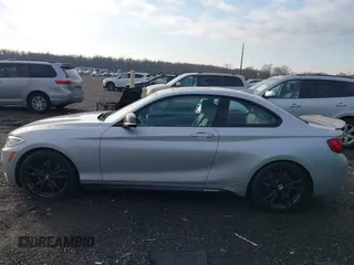 2016 BMW 2 Series M235i with VIN WBA1J7C54GV359301, listed as a IAAI auction lot 41186271 with 97,671 mi miles. Bid and sale history available at carsss.com. Image 14.