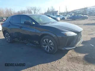 2024 Lexus RZ 300e Premium z VIN JTJABABB9RA005043, wystawiony jako IAAI lot #41452254 z przebiegiem 11 851 mil mil oraz . Historia ofert i sprzedaży dostępna na DreamBid. Obrazek 1.