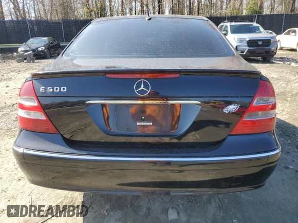 2003 Mercedes-Benz E-Class 5.0L with VIN WDBUF70J53A199951, listed as a Copart auction lot 51138595 with 129,414 mi miles and Salvage Title. Bid and sale history available at carsss.com. Image 6.