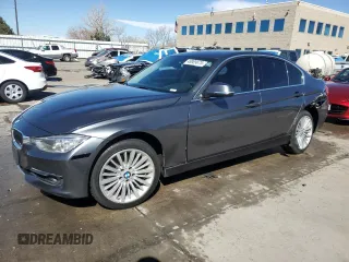 2015 BMW 3 Series 328i xDrive with VIN WBA3B3C50FF548227, listed as a Copart auction lot 48989675 with 80,410 mi miles and Salvage Title. Bid and sale history available at carsss.com. Image 1.