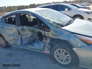 2020 Toyota Prius L Eco with VIN JTDKARFU8L3121625, listed as a IAAI auction lot 41700747 with 79,721 mi miles. Bid and sale history available at carsss.com. Image 6.