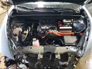 2023 Lexus RZ 450e Premium z VIN JTJAAAAB1PA004373, wystawiony jako Copart lot #48545194 z przebiegiem 21 710 mil mil oraz Szkody całkowita. Historia ofert i sprzedaży dostępna na DreamBid. Obrazek 11.